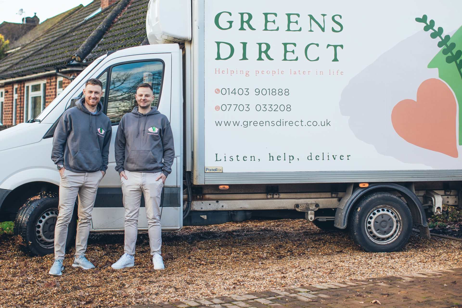 Men beside a delivery truck